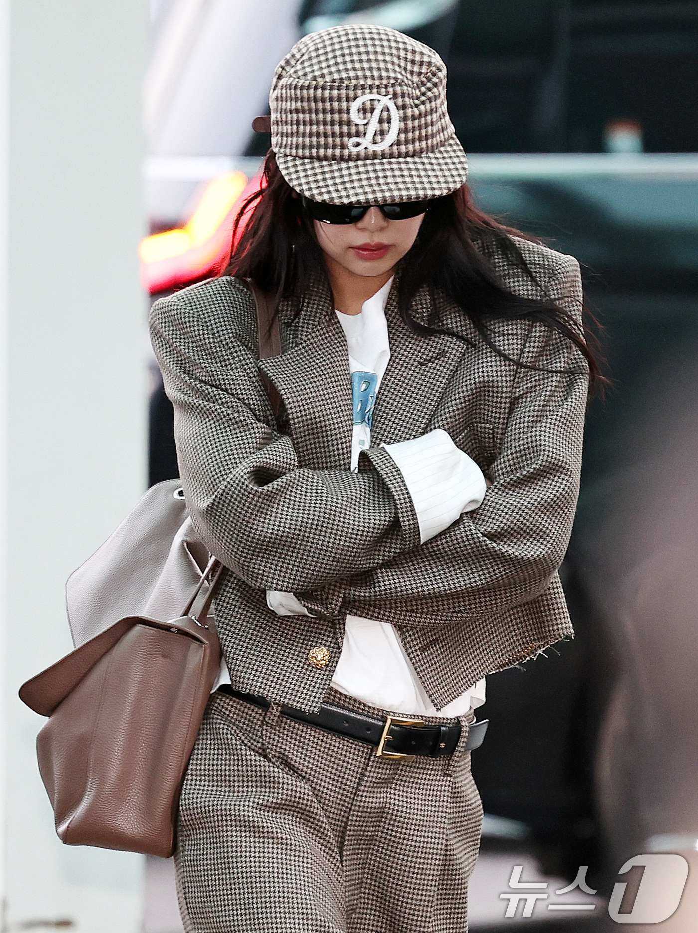 (인천공항=뉴스1) 구윤성 기자 = 블랙핑크 제니가 22일 오전 인천국제공항에서 해외 일정을 위해 홍콩으로 출국하고 있다. 2026.3.22/뉴스1