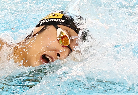 김우민, 온 힘을 다해