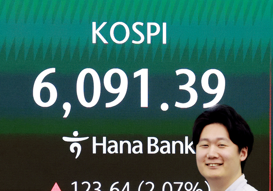 '6000 탈환'···코스피 상승마감