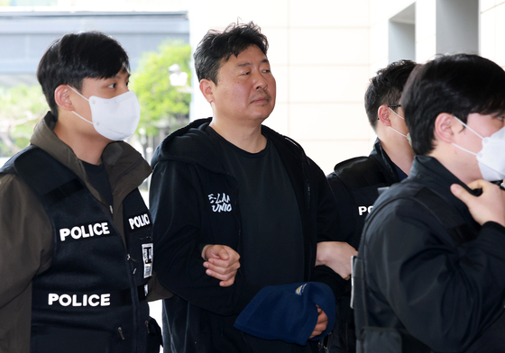 영장실질심사 출석하는 지혜복 씨 복직 요구 시위한 3인