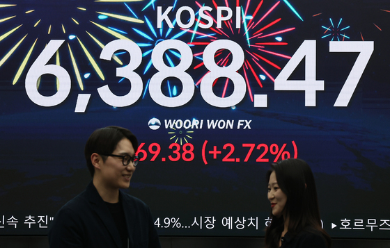 '코스피 새 역사'…반도체 끌고 이차전지·건설주 밀고