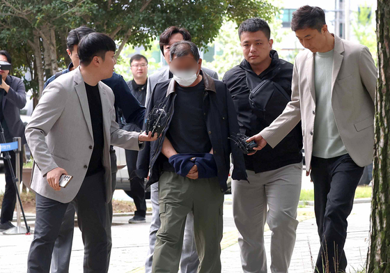 경찰 향해 승합차 돌진 조합원 영장 심사 출석