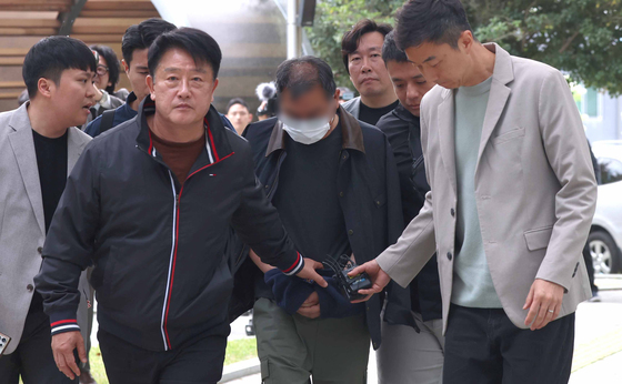 경찰 향해 승합차 돌진 조합원 영장 심사 출석