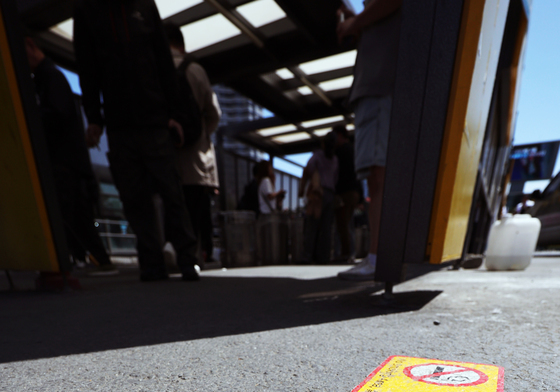 액상형 '전담'도 '담배'…'흡연구역에서 피우세요'