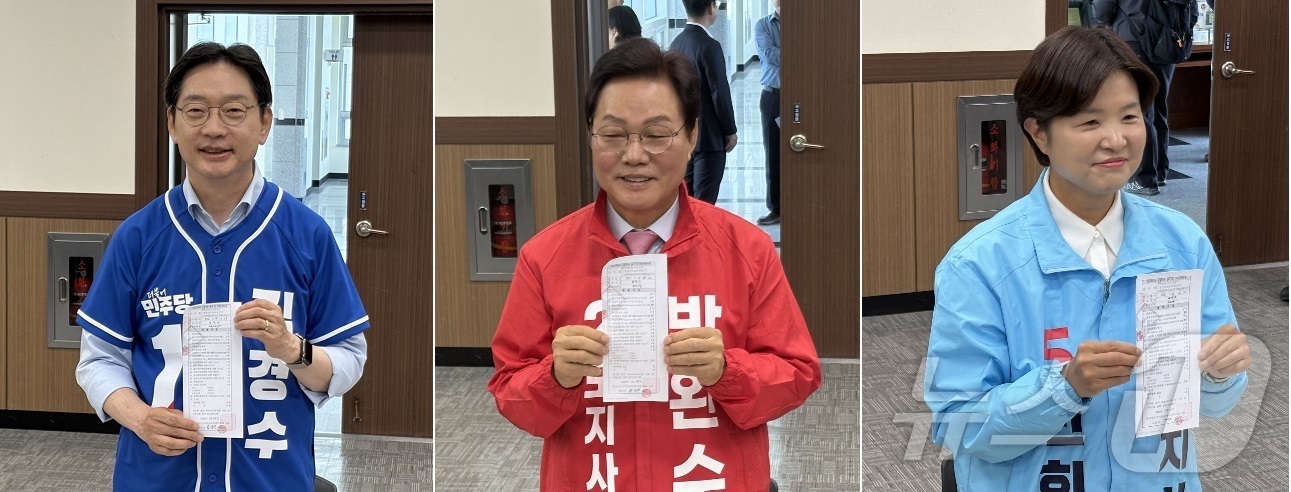 (창원=뉴스1) 강정태 기자 = 김경수 더불어민주당 경남지사 후보(왼쪽부터), 박완수 국민의힘 경남지사 후보, 전희영 진보당 경남지사 후보가 14일 경남 창원시 경남도선거관리위원회 …