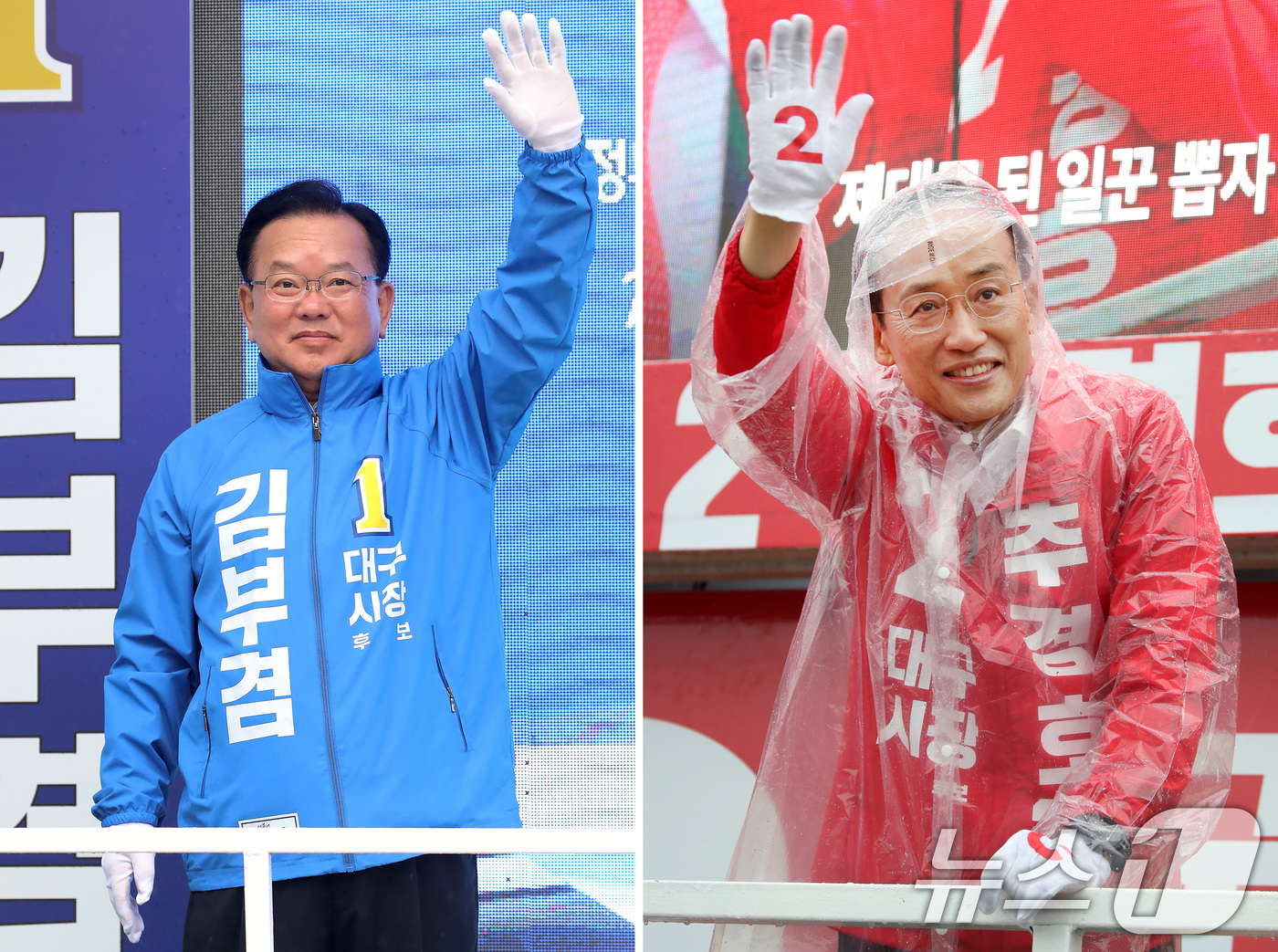 (대구=뉴스1) 공정식 기자 = 김부겸 더불어민주당 대구시장 후보(왼쪽)가 27일 오전 대구 북구 태전네거리에서 출근길 시민들을 향해 인사하고 있다.같은 날 오전 추경호 국민의힘 …
