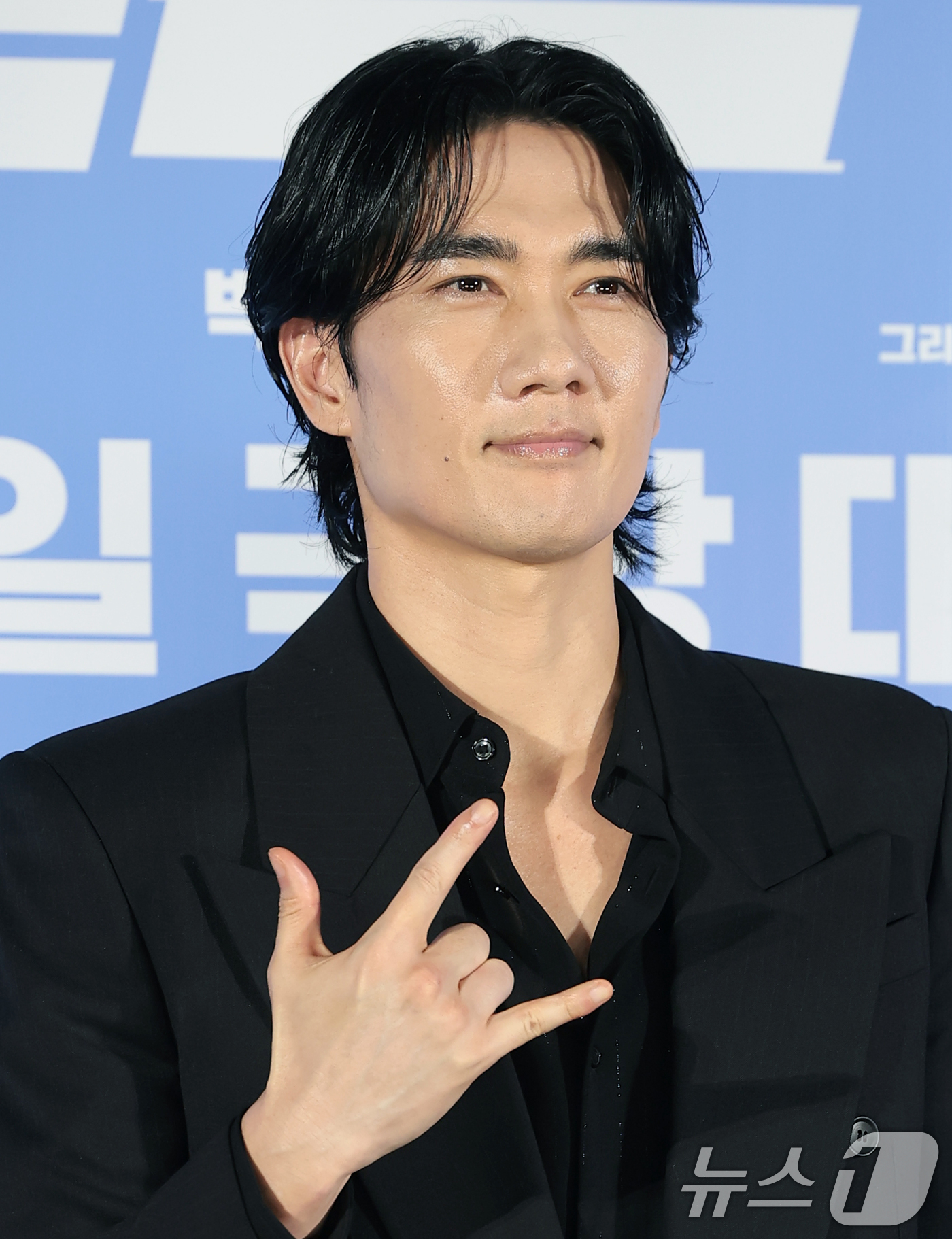 (서울=뉴스1) 권현진 기자 = 배우 엄태구가 7일 서울 광진구 롯데시네마 건대입구에서 열린 영화 '와일드 씽' 제작보고회에서 포즈를 취하고 있다.'와일드 씽'은 한때 가요계를 휩 …