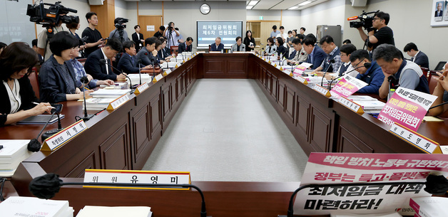 도급제 적용 부결 규탄하는 근로자위원들