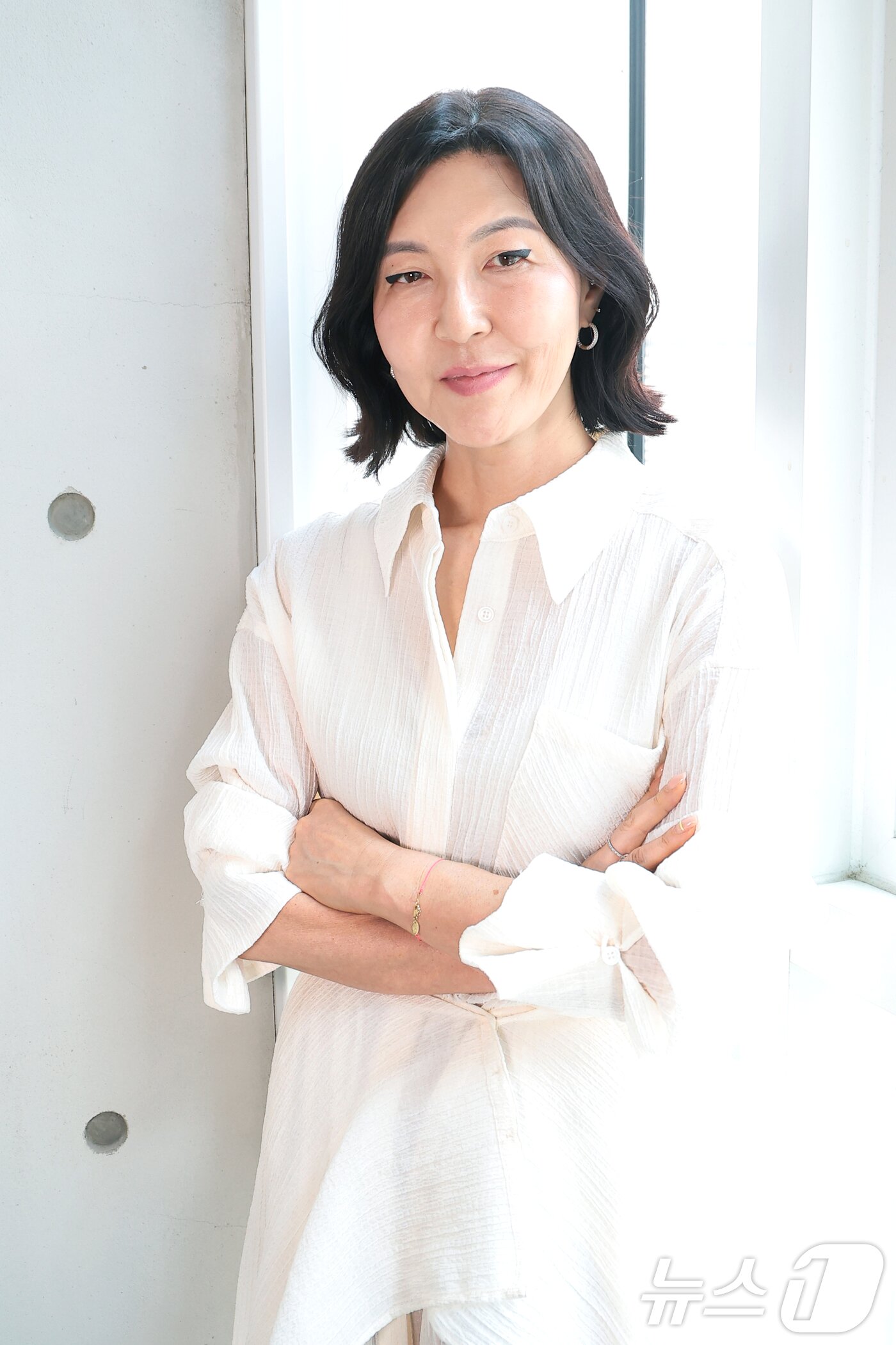 본문 이미지 - 스타일리스트 한혜연이 뉴스1과의 인터뷰에서 포즈를 취하고 있다. ⓒ 뉴스1 권현진 기자