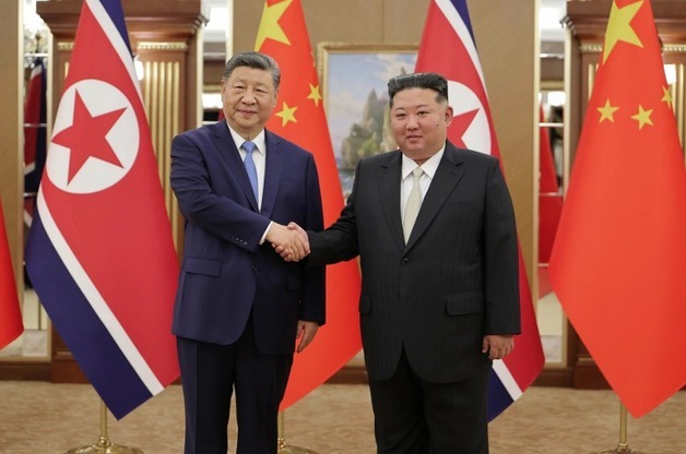 北 "시진핑·김정은, 견해일치로 관계 발전의 새 장 열어"