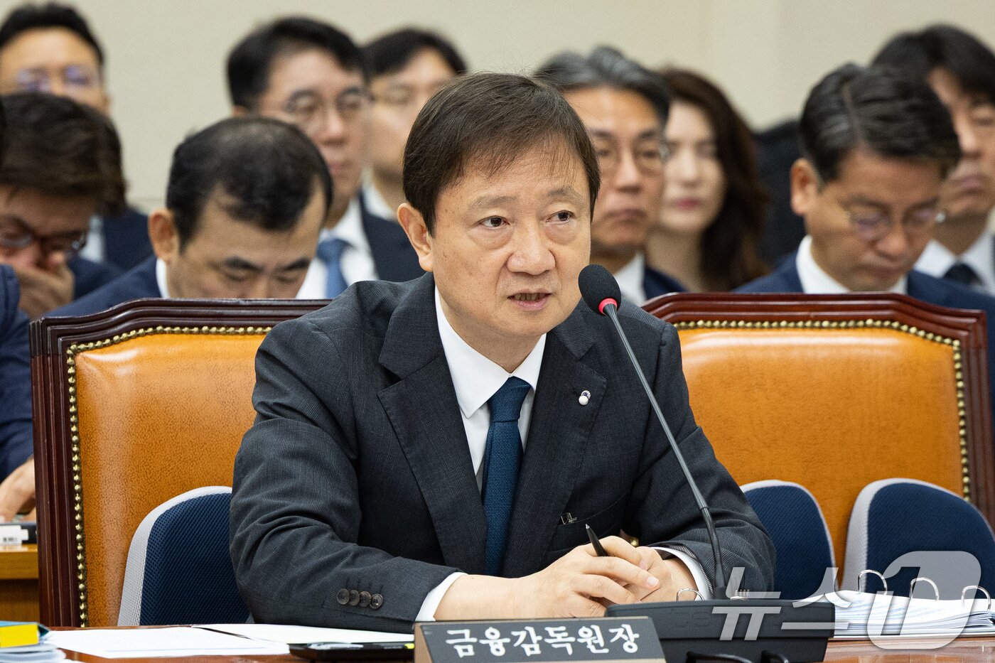 본문 이미지 - 이찬진 금융감독원장이 21일 서울 여의도 국회에서 열린 홈플러스 회생 관련 정무위원회 간담회에 출석해 의원 질의에 답하고 있다. 2026.7.21 ⓒ 뉴스1 유승관 기자