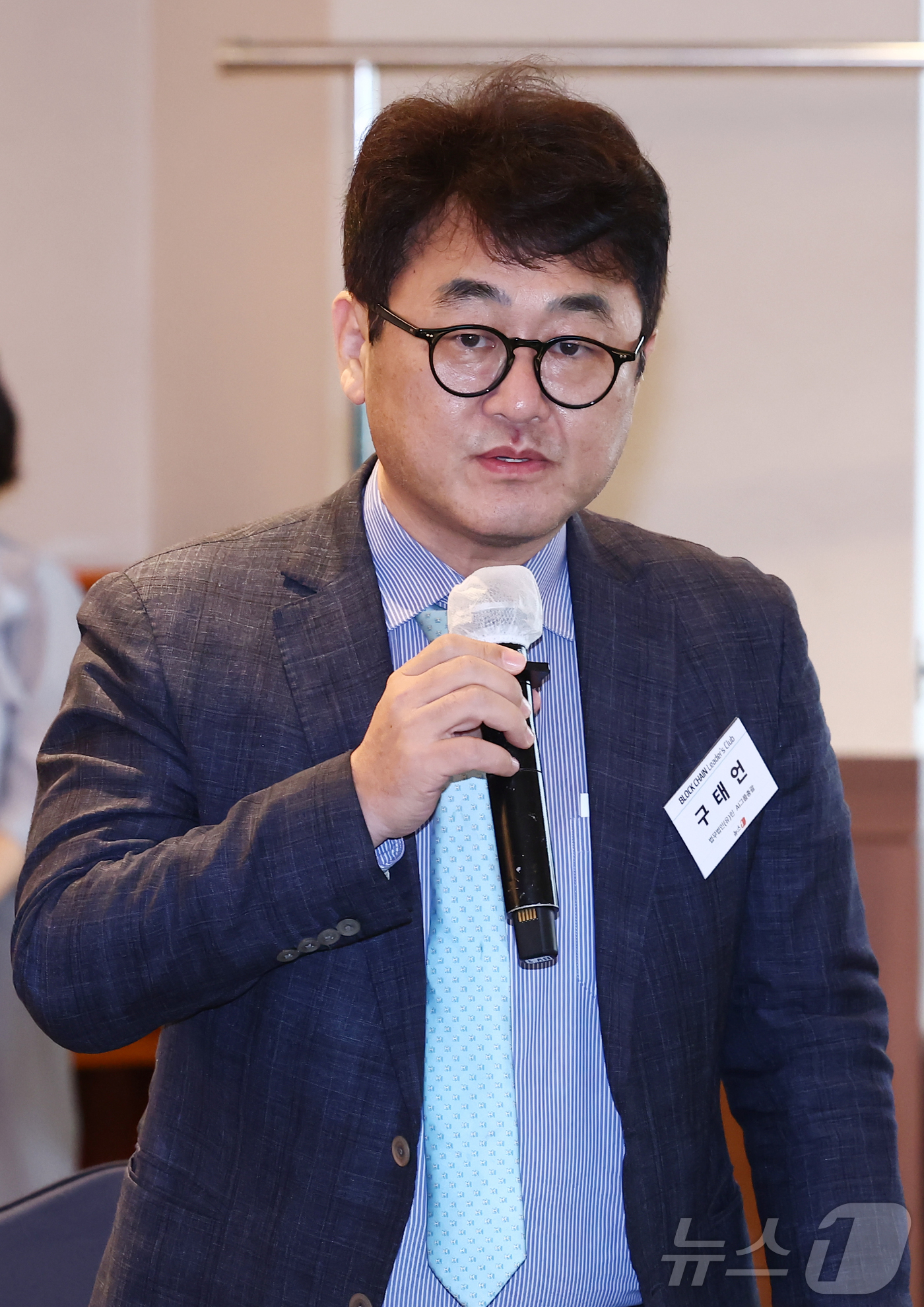(서울=뉴스1) 김민지 기자 = 구태언 법무법인(유)린 AI그룹총괄이 22일 오전 서울 중구 롯데호텔에서 열린 제10회 뉴스1 블록체인리더스클럽에서 1분 스피치를 하고 있다. 20 …