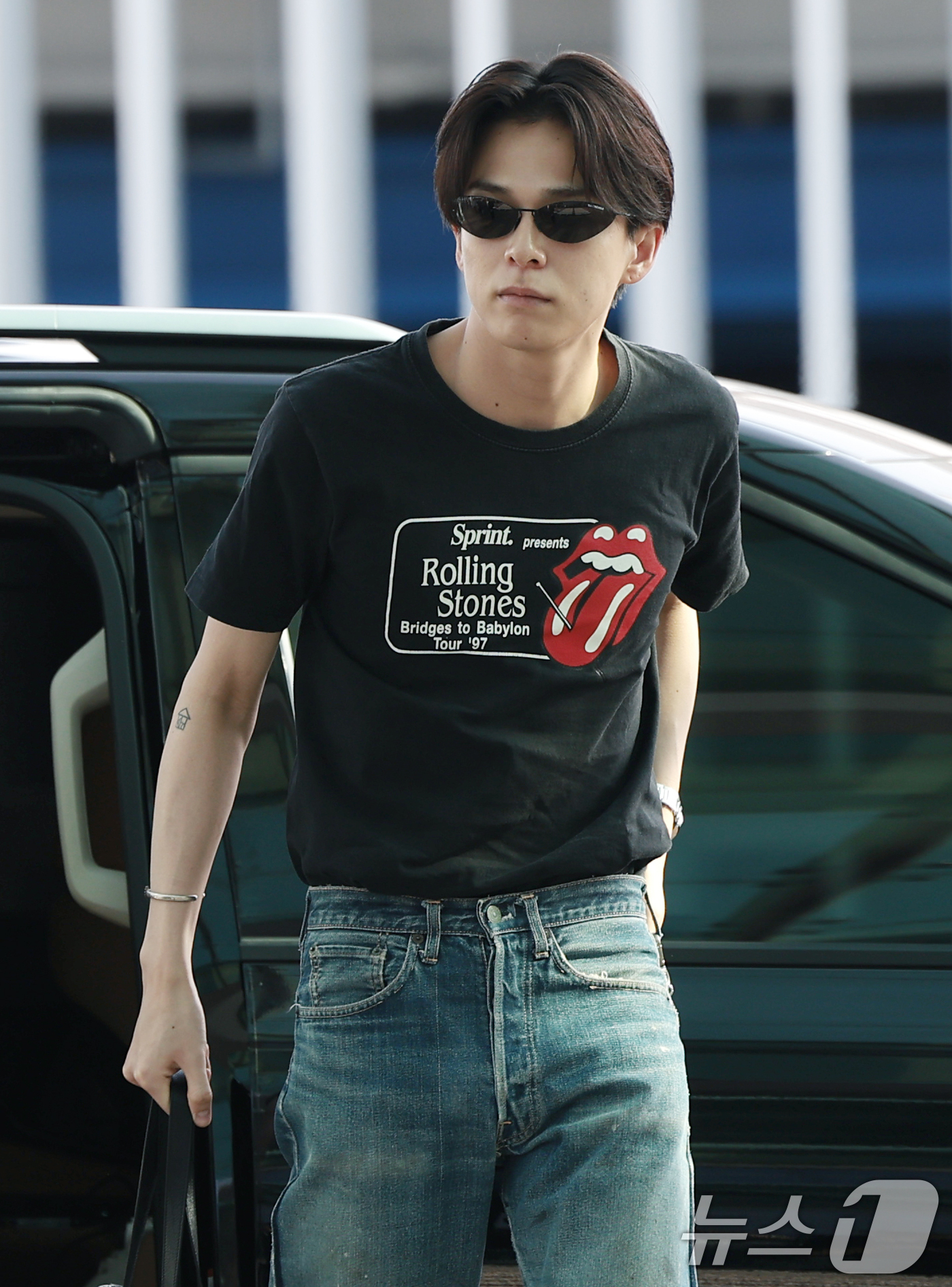 (인천공항=뉴스1) 권현진 기자 = 그룹 트레저(TREASURE) 아사히가 31일 해외 일정을 위해 인천국제공항을 통해 출국하고 있다. 2026.7.31/뉴스1