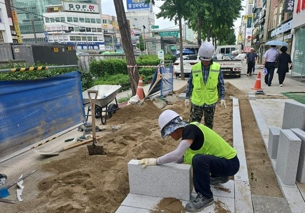 "보행로 침범하던 불법 유턴"…국립민속박물관 앞 보도 신설