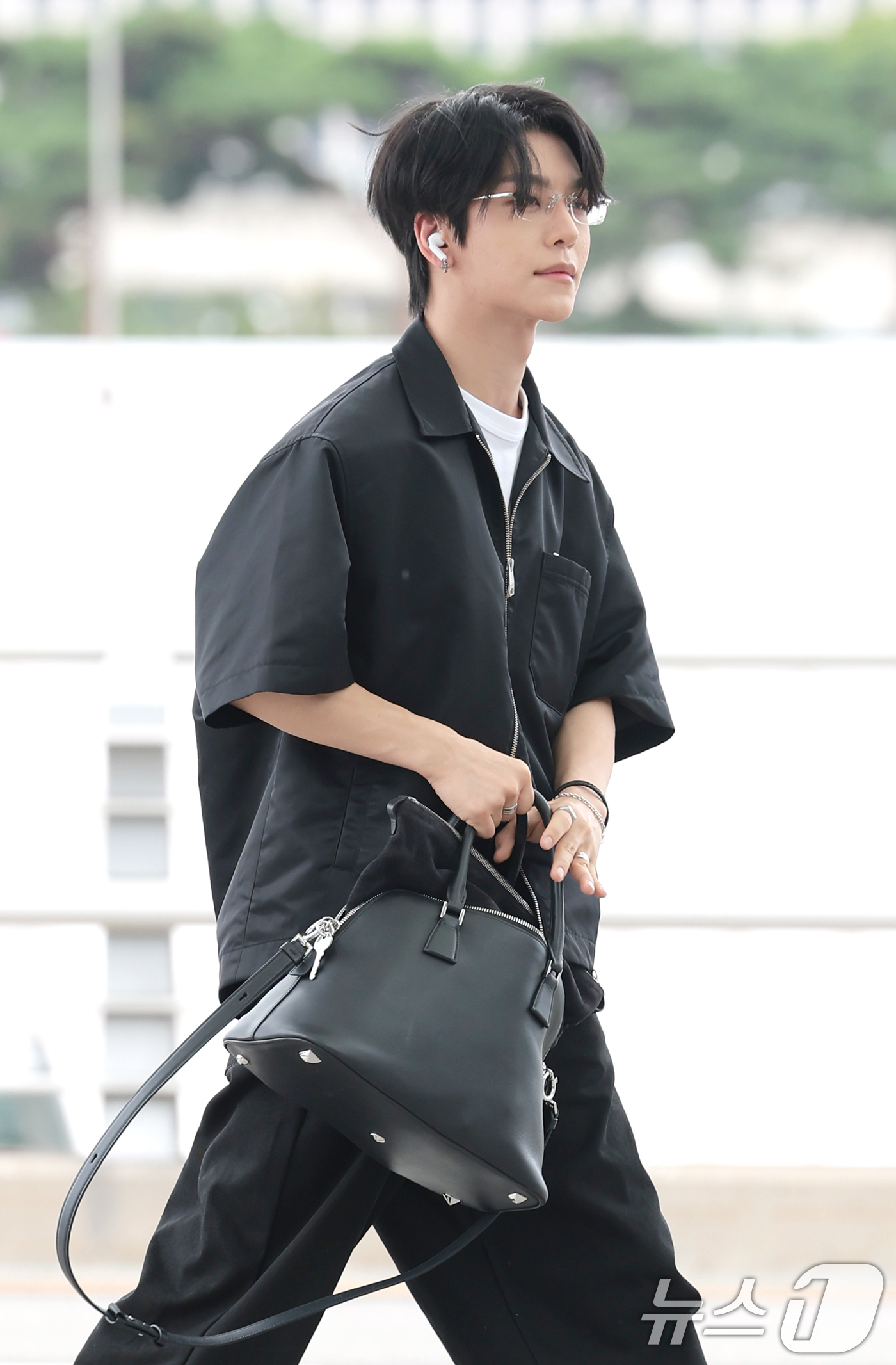 (인천공항=뉴스1) 권현진 기자 = 알파드라이브원이(ALPHA DRIVE ONE) 씬롱이 해외 일정을 위해 21일 인천국제공항을 통해 홍콩으로 출국하고 있다. 2026.8.21/뉴 …