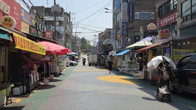 [르포] "골목에 사람이 없어요"…역대급 폭염에 전통시장도 멈췄다