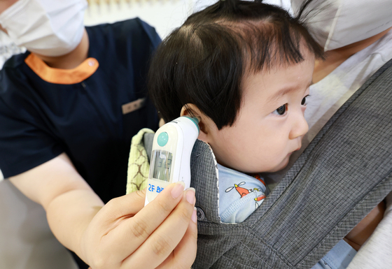 무섭게 확산하는 독감…초등생 환자 1000명당 80명 육박