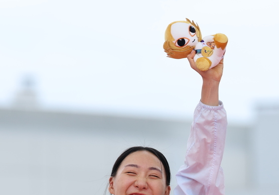 성승민, 한국 첫 금메달
