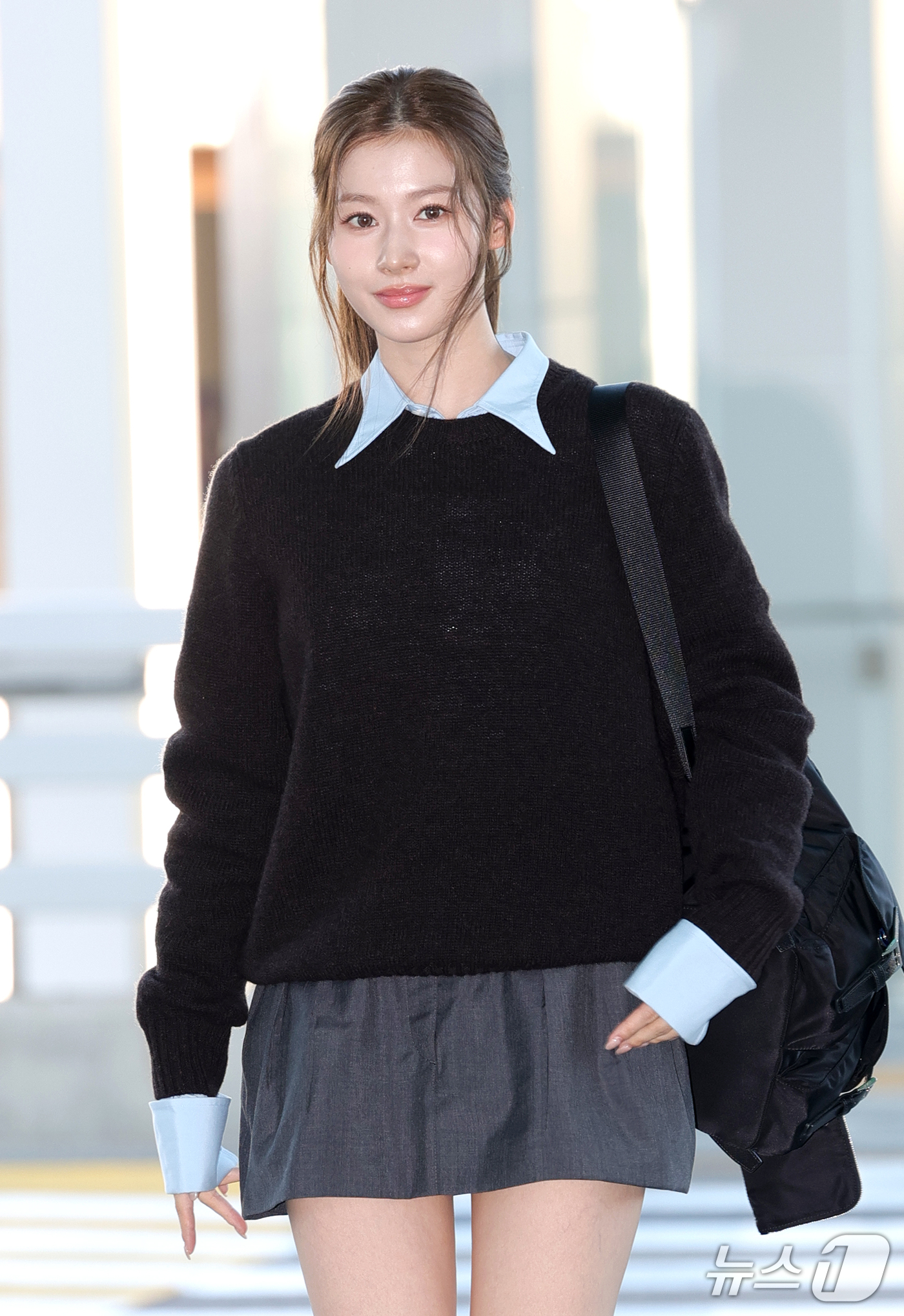 (인천공항=뉴스1) 권현진 기자 = 트와이스(TWICE) 사나가 해외 일정을 위해 21일 오전 인천국제공항을 통해 밀라노로 출국하고 있다. 2026.9.21/뉴스1