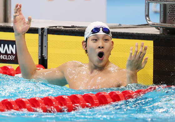 [속보] 김영범, 자유형 남자 50m 대회신기록으로 금메달