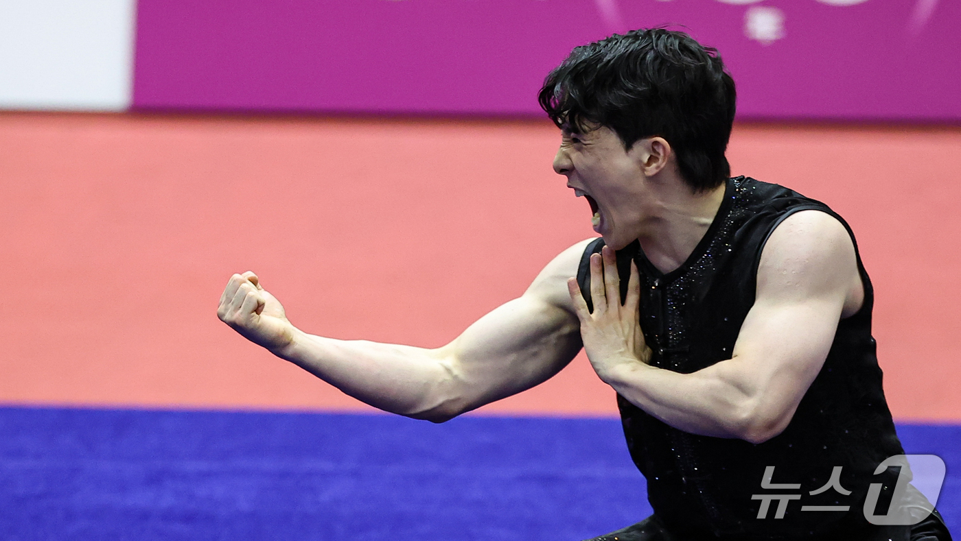 (나고야=뉴스1) 김도우 기자 = 대한민국 김진수가 22일 일본 나고야 아이치현 무도관 열린 2026 아이치·나고야 아시안게임 우슈 남자 투로 남권 결선에서 경기를 펼치고 있다. …