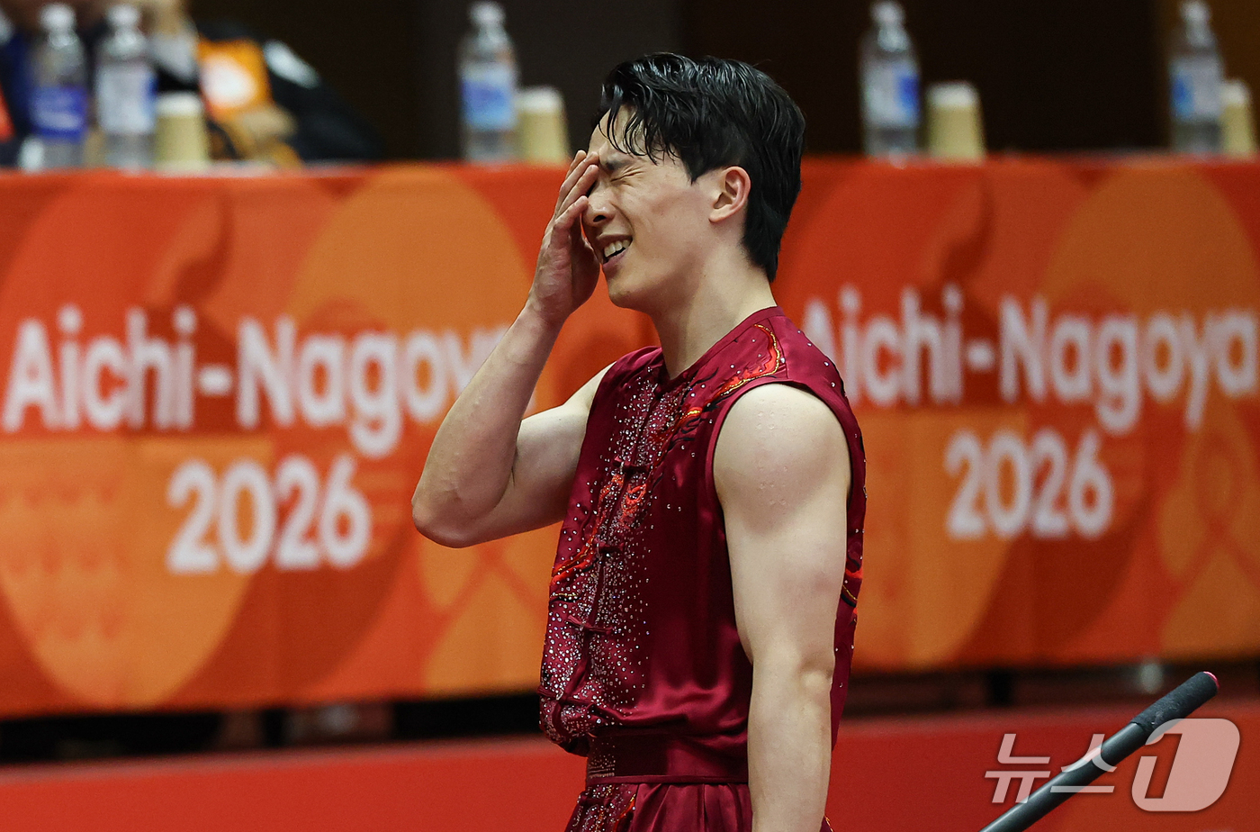(나고야=뉴스1) 김도우 기자 = 대한민국 김진수가 22일 일본 나고야 아이치현 무도관 열린 2026 아이치·나고야 아시안게임 우슈 남자 투로 남곤 결선에서 경기결과 확인 후 아쉬 …