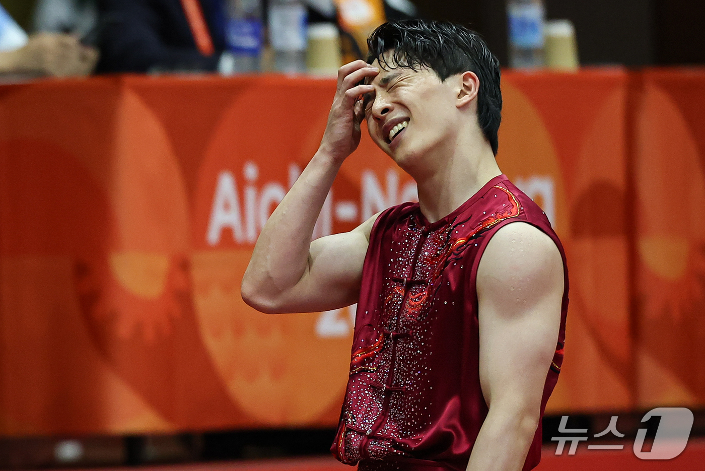 (나고야=뉴스1) 김도우 기자 = 대한민국 김진수가 22일 일본 나고야 아이치현 무도관 열린 2026 아이치·나고야 아시안게임 우슈 남자 투로 남곤 결선에서 경기결과 확인 후 아쉬 …