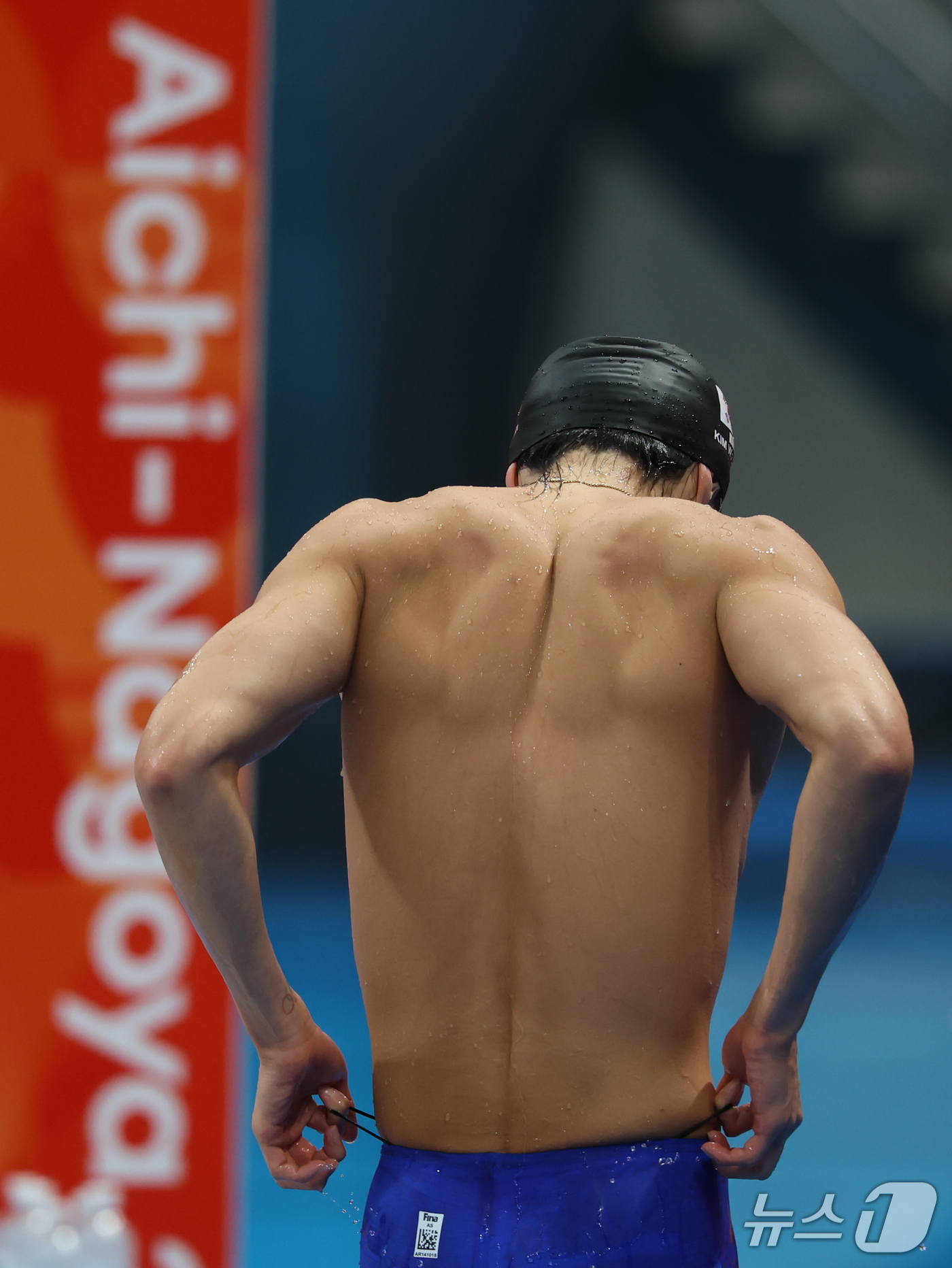 (도쿄=뉴스1) 김민지 기자 = 22일 도쿄 아쿠아틱스 센터에서 열린 2026 아이치·나고야 아시안게임 남자 1500m 자유형 결승전에서 김우민이 8위로 레이스를 마친 뒤 경기장을 …