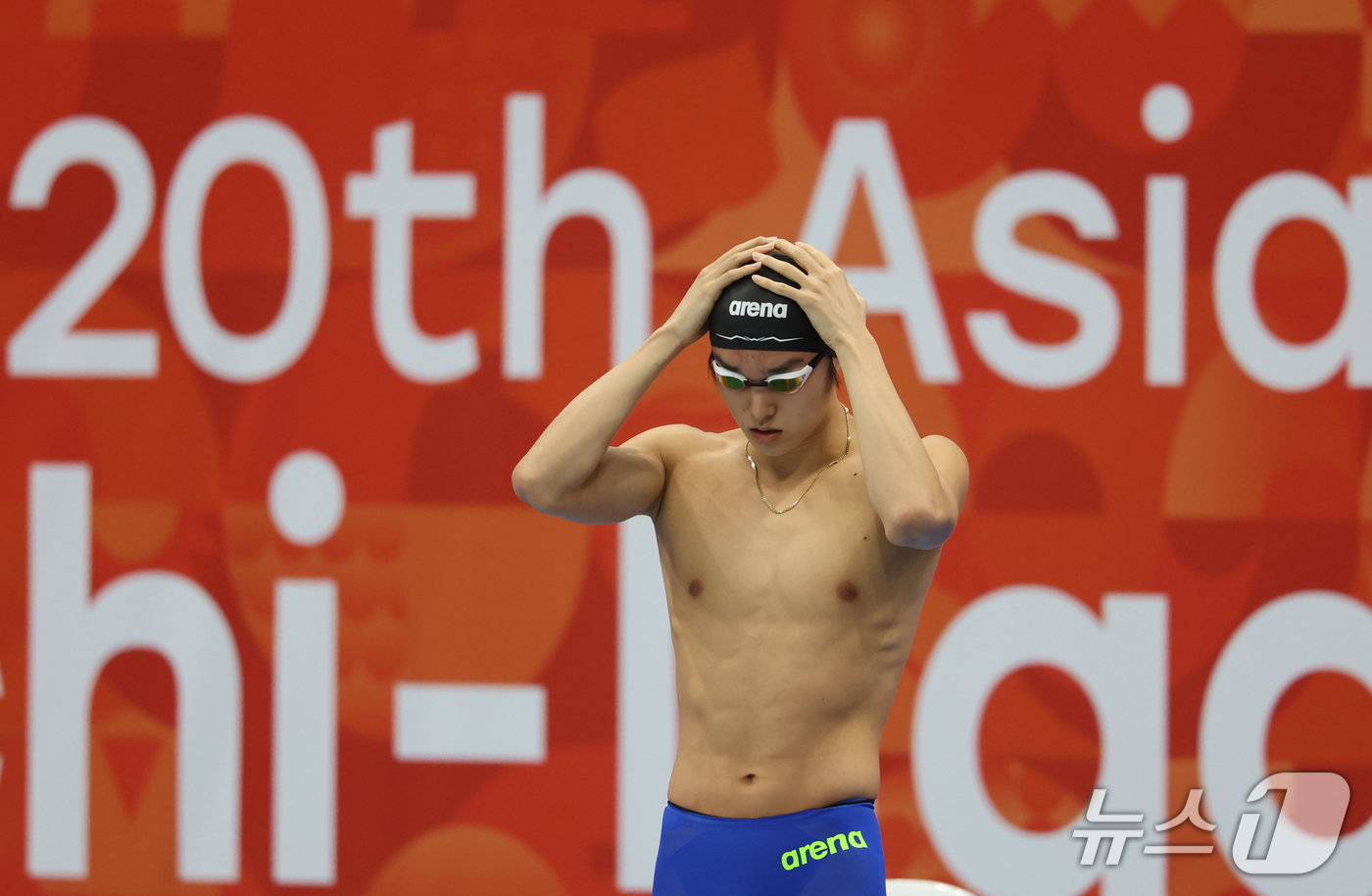 (도쿄=뉴스1) 김민지 기자 = 22일 일본 도쿄 아쿠아틱스 센터에서 열린 2026 아이치·나고야 아시안게임 수영 남자 1500m 결승에서 김우민이 준비하고 있다. 2026.9.2 …