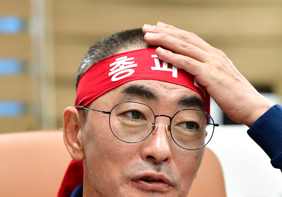 삭발한 김성호 포스코노조위원장